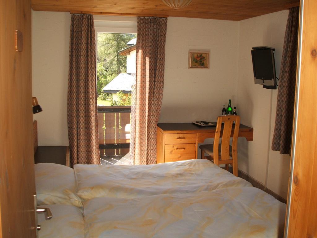 Hotel Erzhorn Arosa Pokoj fotografie